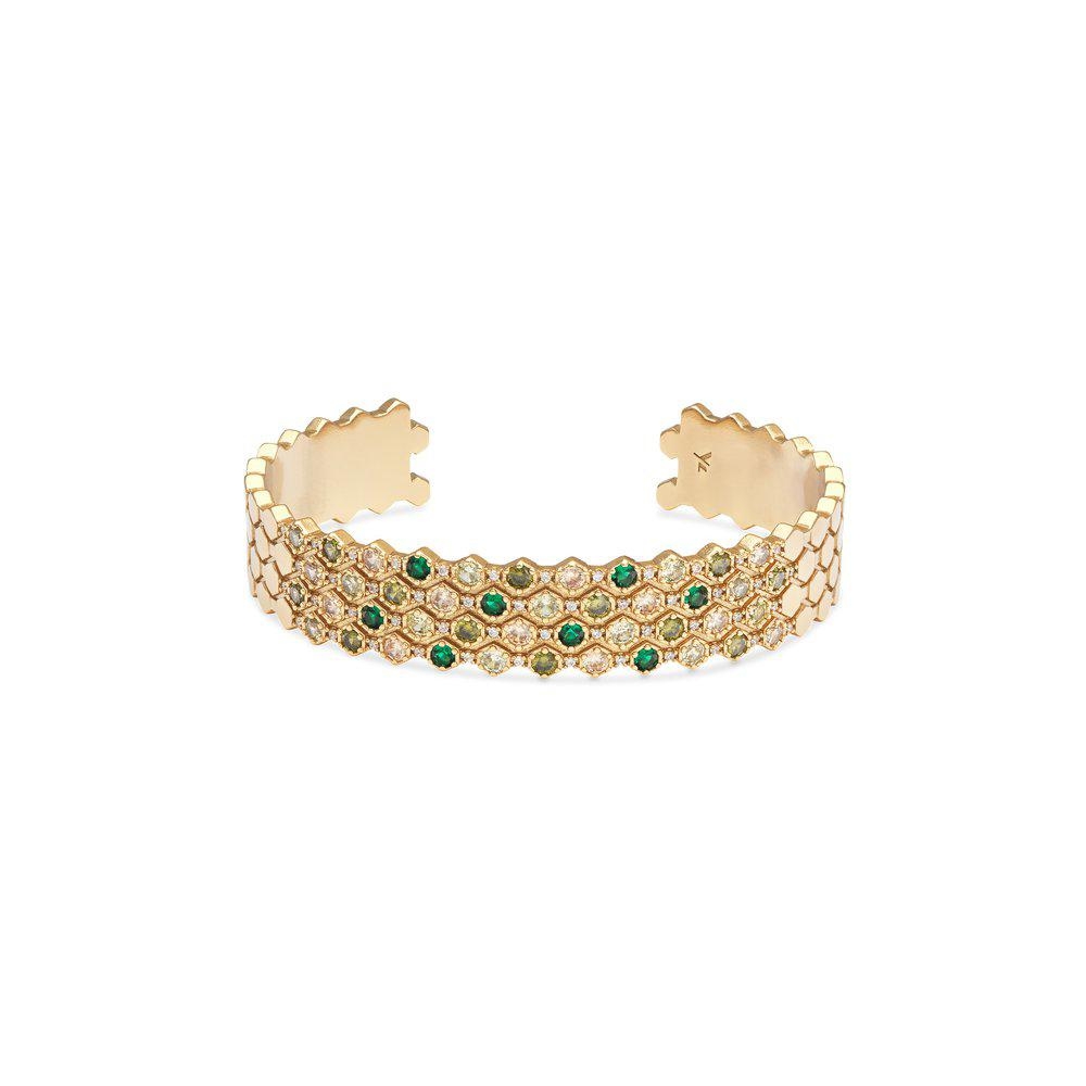 Transcend time with this art-deco-inspired cuff bracelet with its gold-plated geomatric elements and the glitz of emerald, peridot and champagne-coloured stones. It can be worn as an eye-alluring stand-alone piece or combined with the Halo ring.