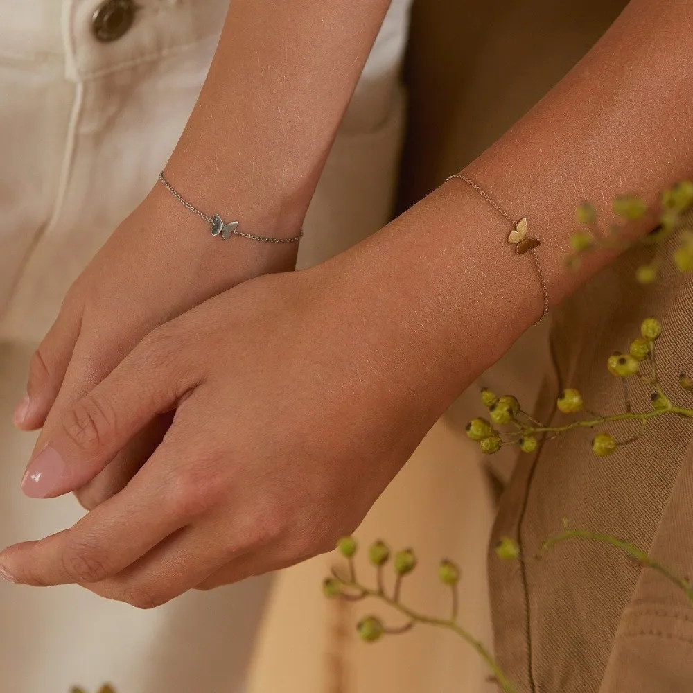 EDBLAD PAPILLON BUTTERFLY BRACELET STEEL and GOLD på hånden